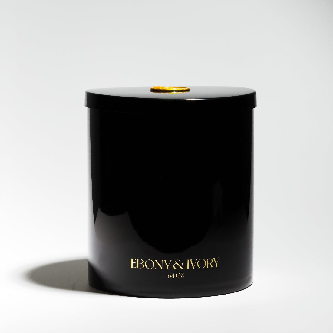 Black luxury candle jar with gold logo and gold seal. Best non toxic candle Canada, huge large statement soy candle. 4 wick. Ebony & Ivory candle co.