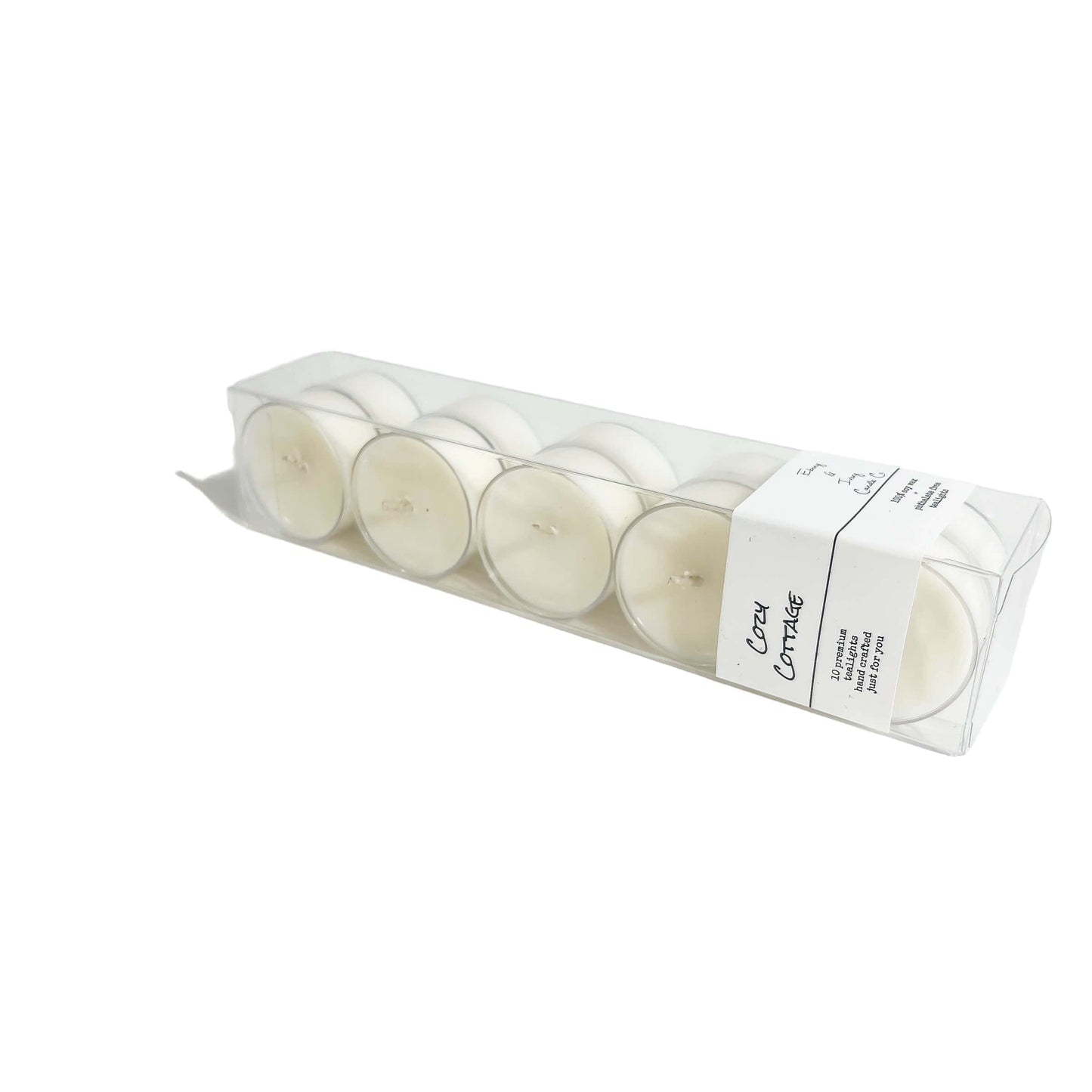 A clear box of 10 soy tea lights with a white label named Cozy Cottage, on a white background, made by Ebony & Ivory Candle Co in Lethbridge, Alberta, Canada