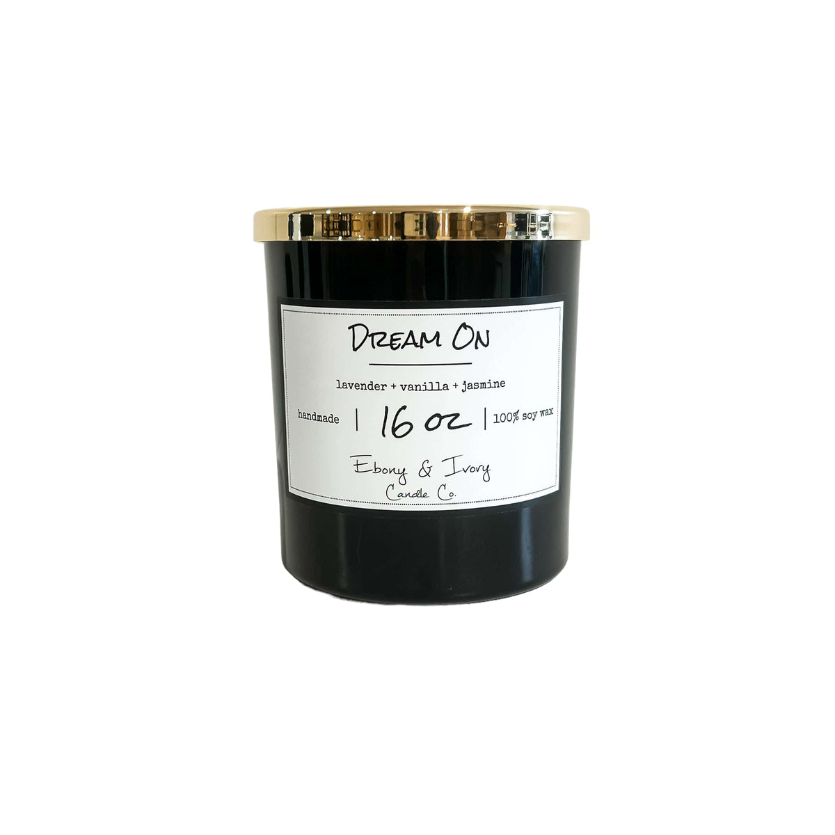 A black 16oz jar soy candle with a gold lid and a white label named Dream On, on a white background, made by Ebony & Ivory Candle Co in Lethbridge, Alberta, Canada