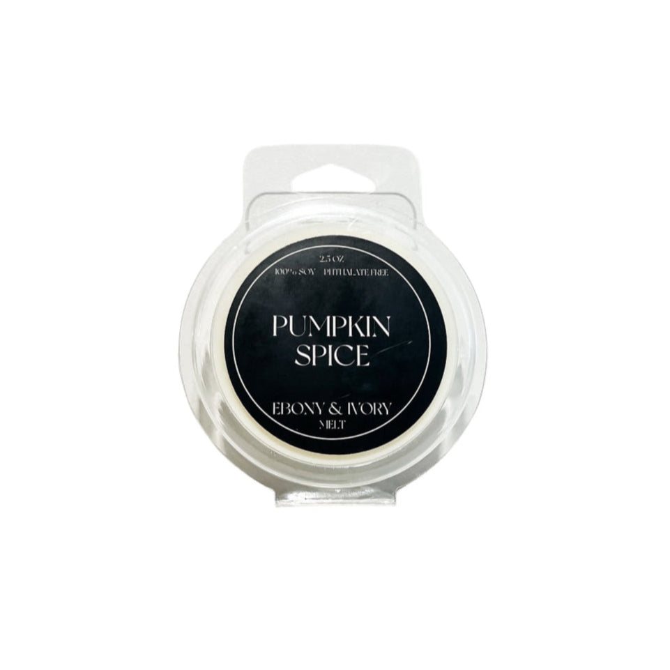 Pumpkin Spice wax melt in a clear container on a white background
