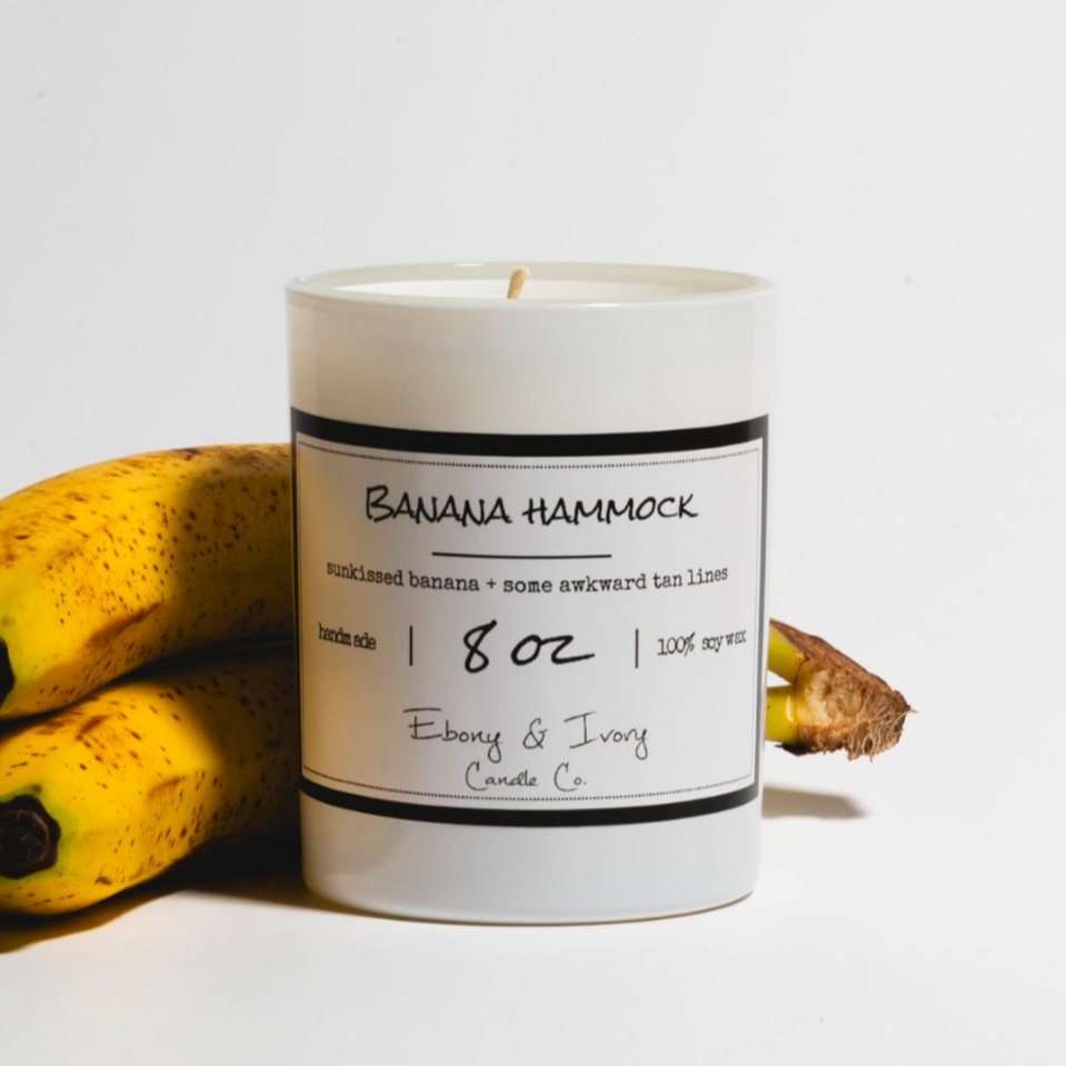 Candle labeled 'Banana Hammock' with bananas on a white background