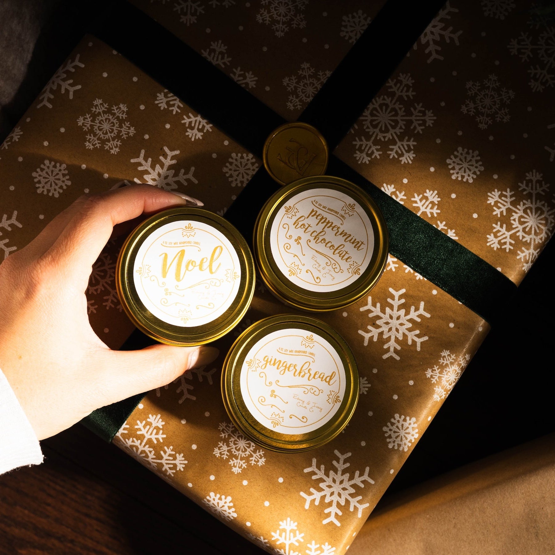 Three small Christmas candles in gold tins for stocking stuffers