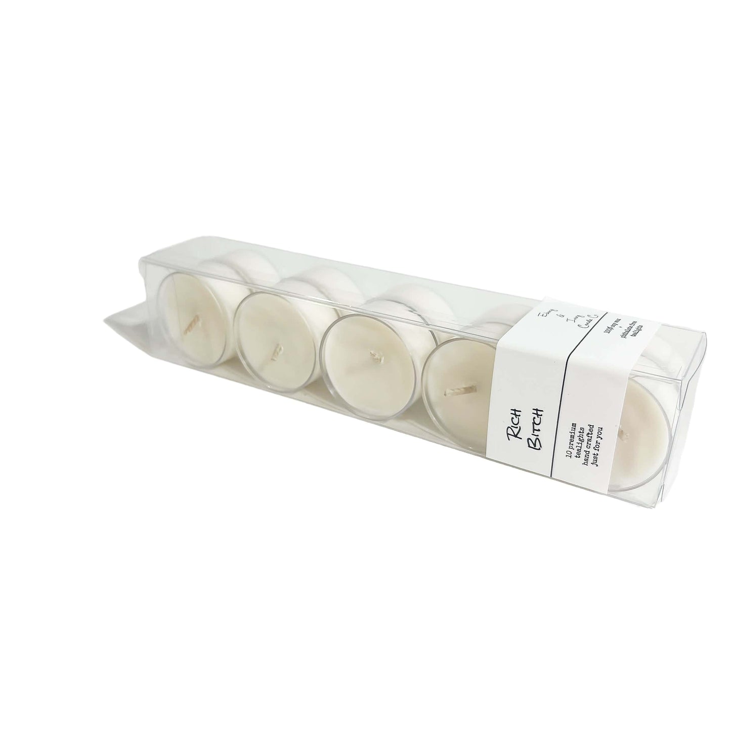 A clear box of 10 soy tea lights with a white label named Rich Bitch, on a white background, made by Ebony & Ivory Candle Co in Lethbridge, Alberta, Canada