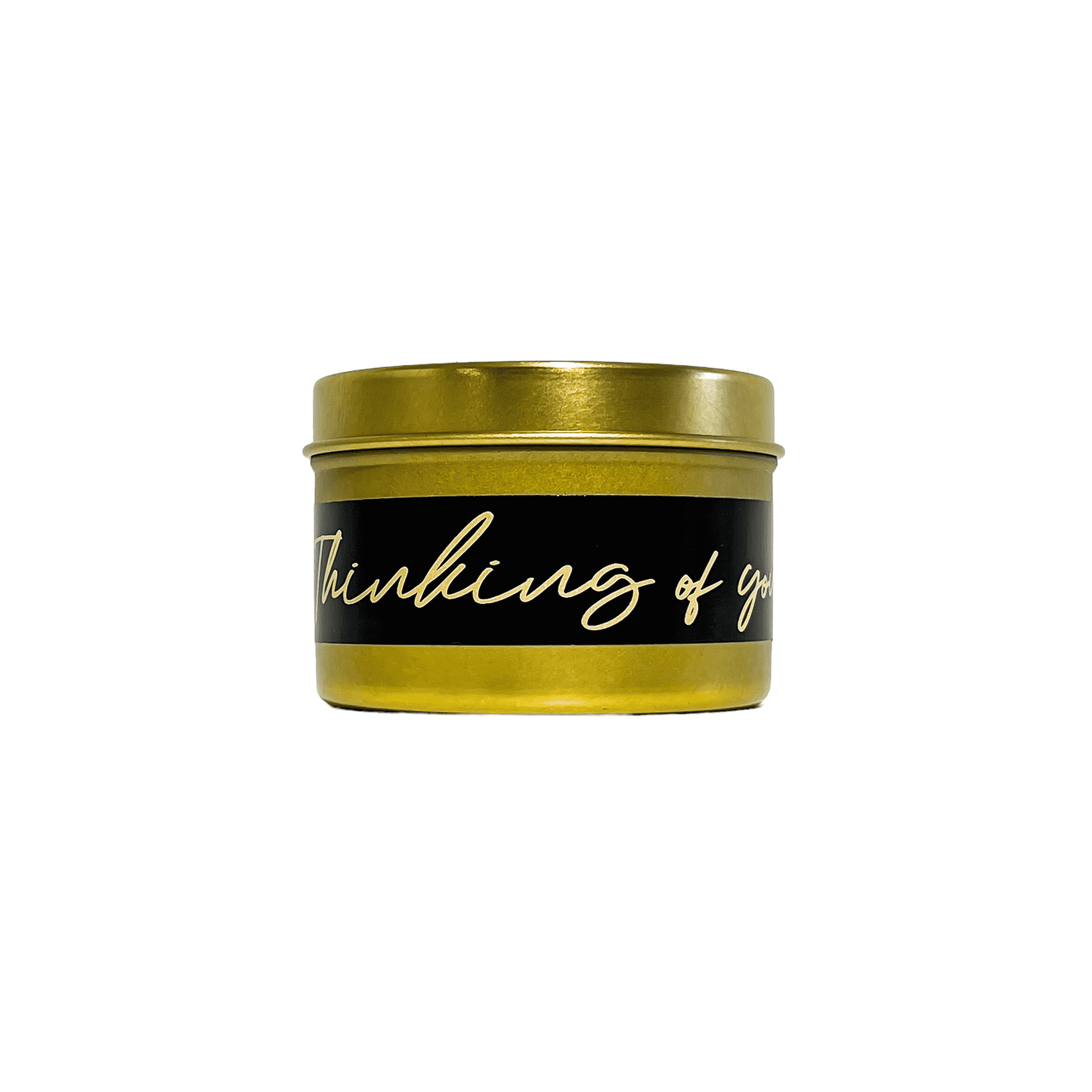 gold four ounces, pink salt and water lily scented soy wax candle with a gold and a black label that reads Thinking of you