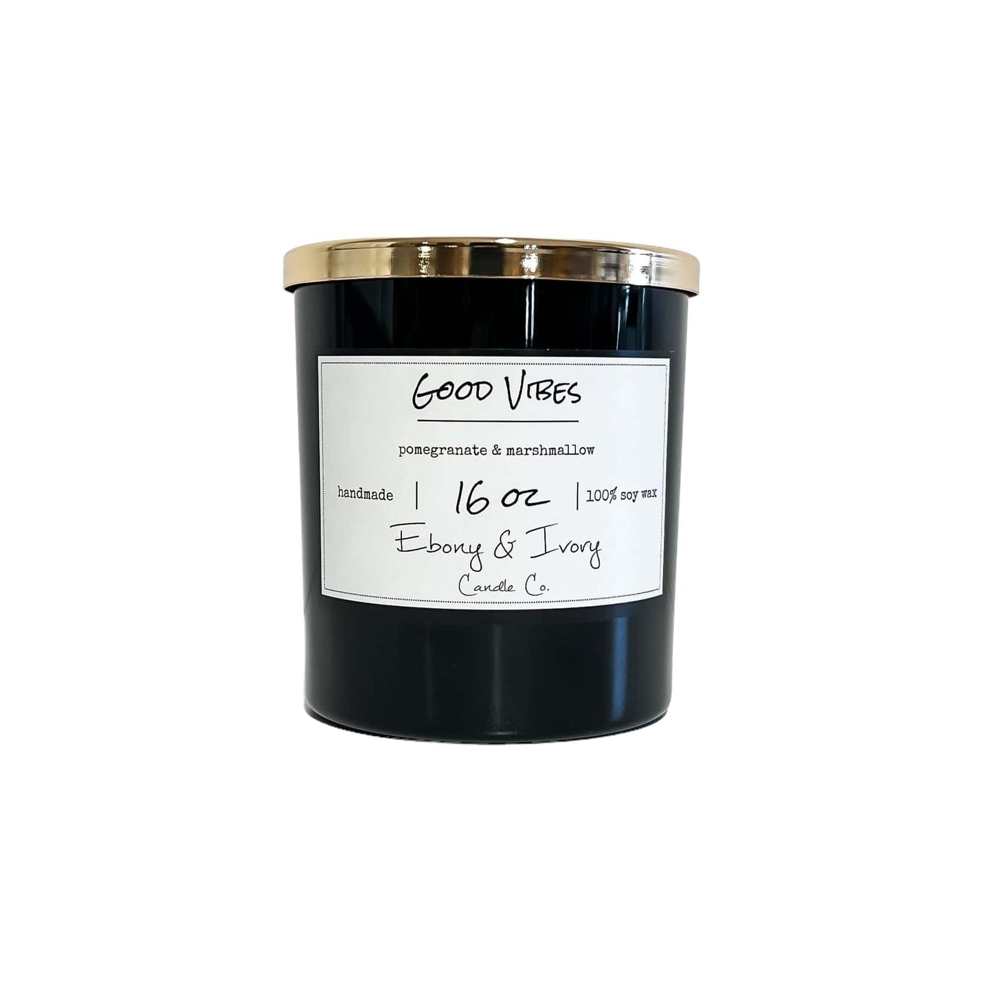 Black sixteen ounce, Pomegranate and Marshmallow scented soy wax candle with a gold lid and a white label that reads Good Vibes