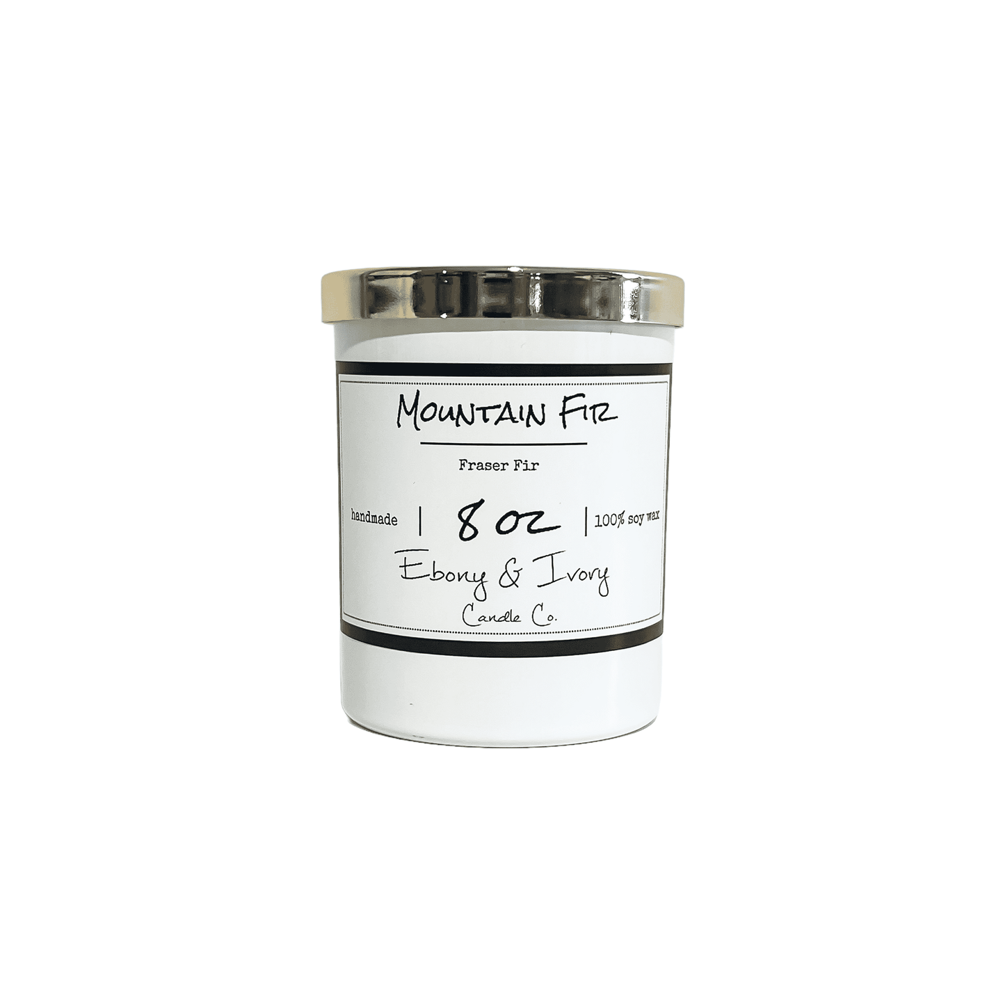 White, eight ounce, fraser fir tree scented soy wax candle with a gold lid and a white label that reads Mountain Fir