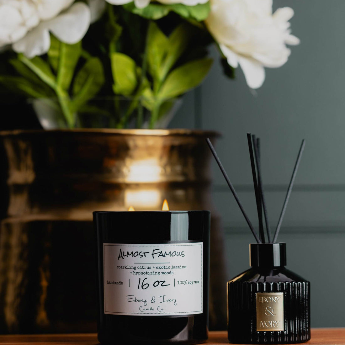luxury soy candle and reed diffuser creating a cozy home fragrance atmosphere