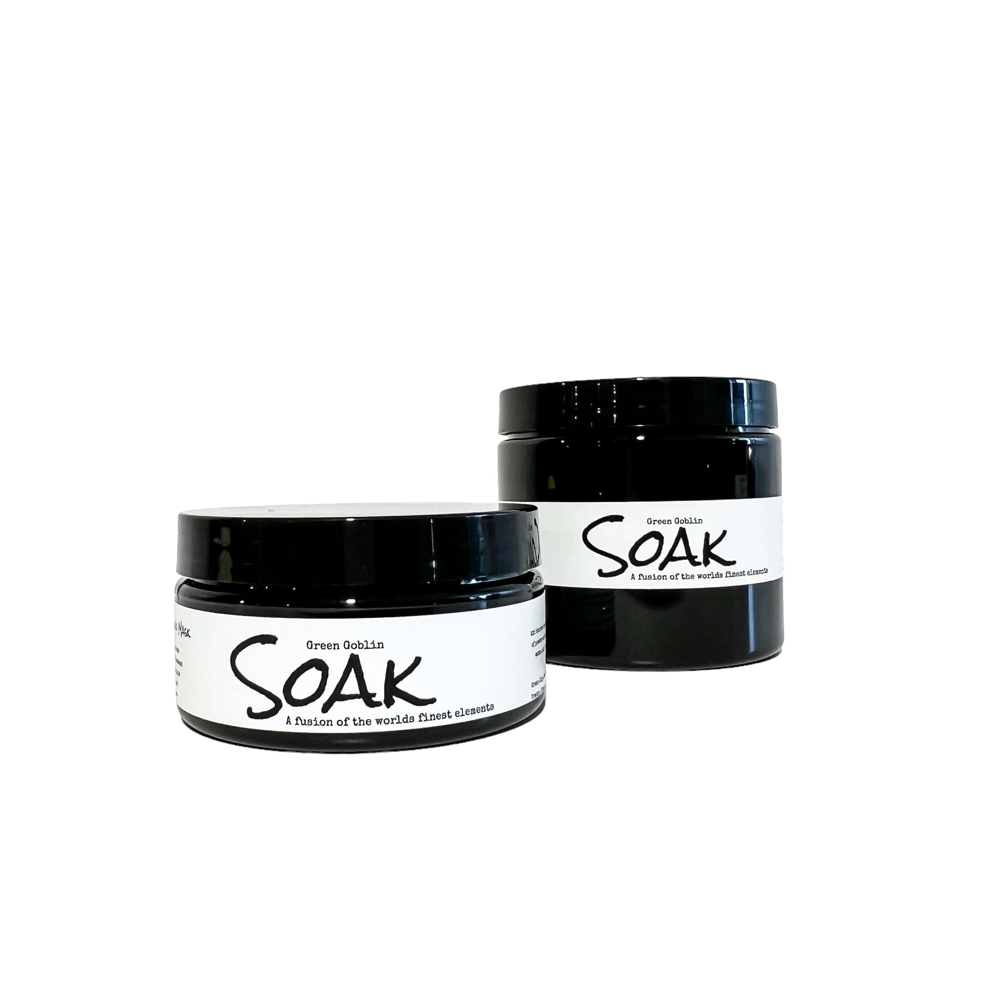 a 4oz and an 8oz round black jars with a white label named Green Goblin Clay Soak, on a white background, made by Ebony & Ivory Candle Co in Lethbridge, Alberta, Canada