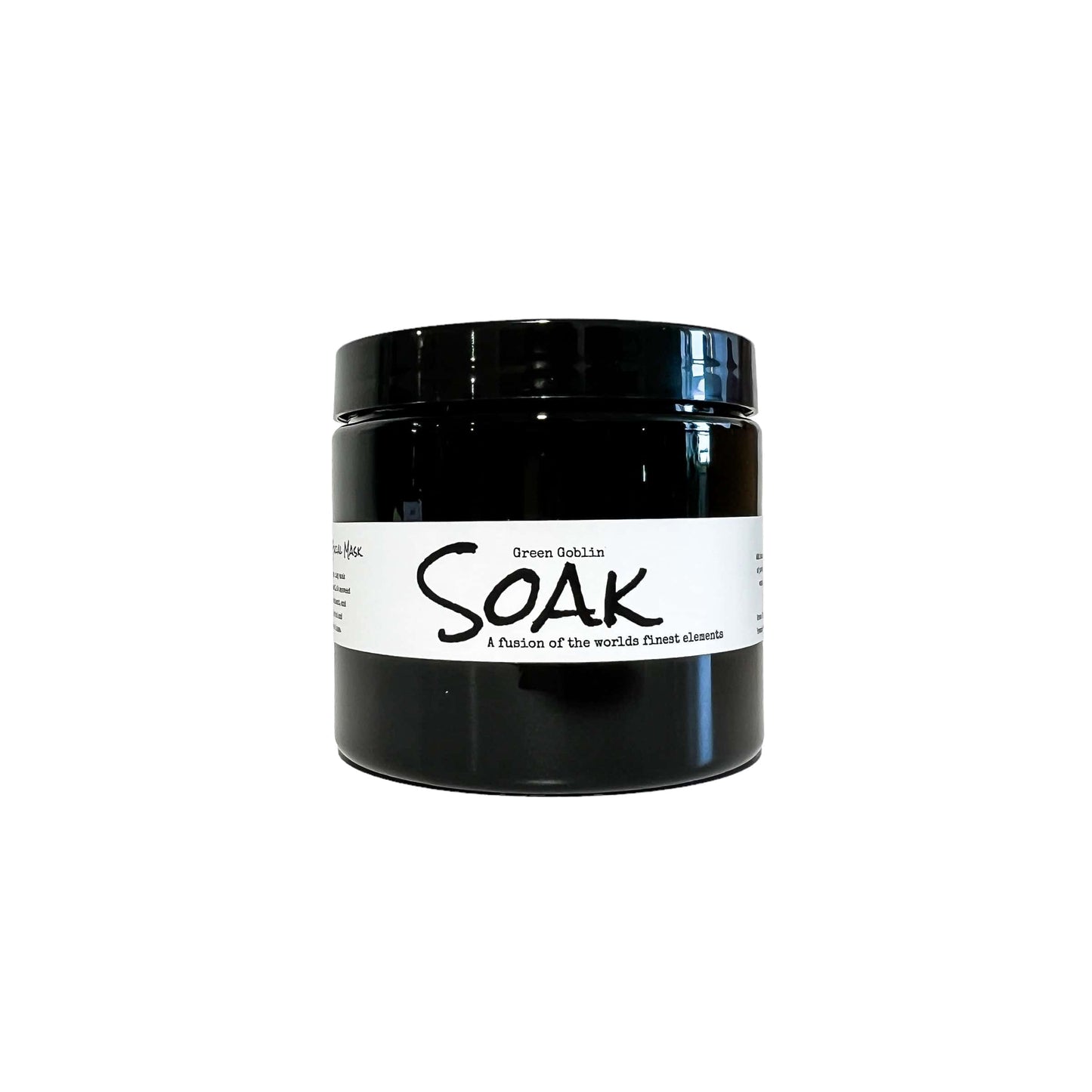 An 8oz round black jar with a white label named Green Goblin Clay Soak, on a white background, made by Ebony & Ivory Candle Co in Lethbridge, Alberta, Canada