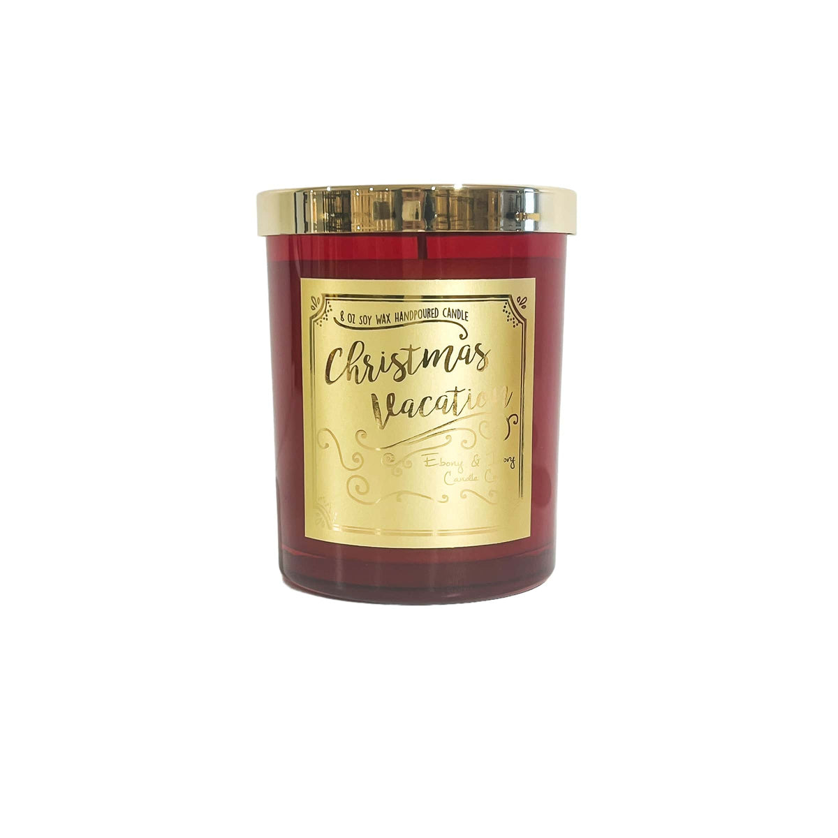 A red 8oz soy christmas candle with a gold lid and a gold label named "christmas vacation"