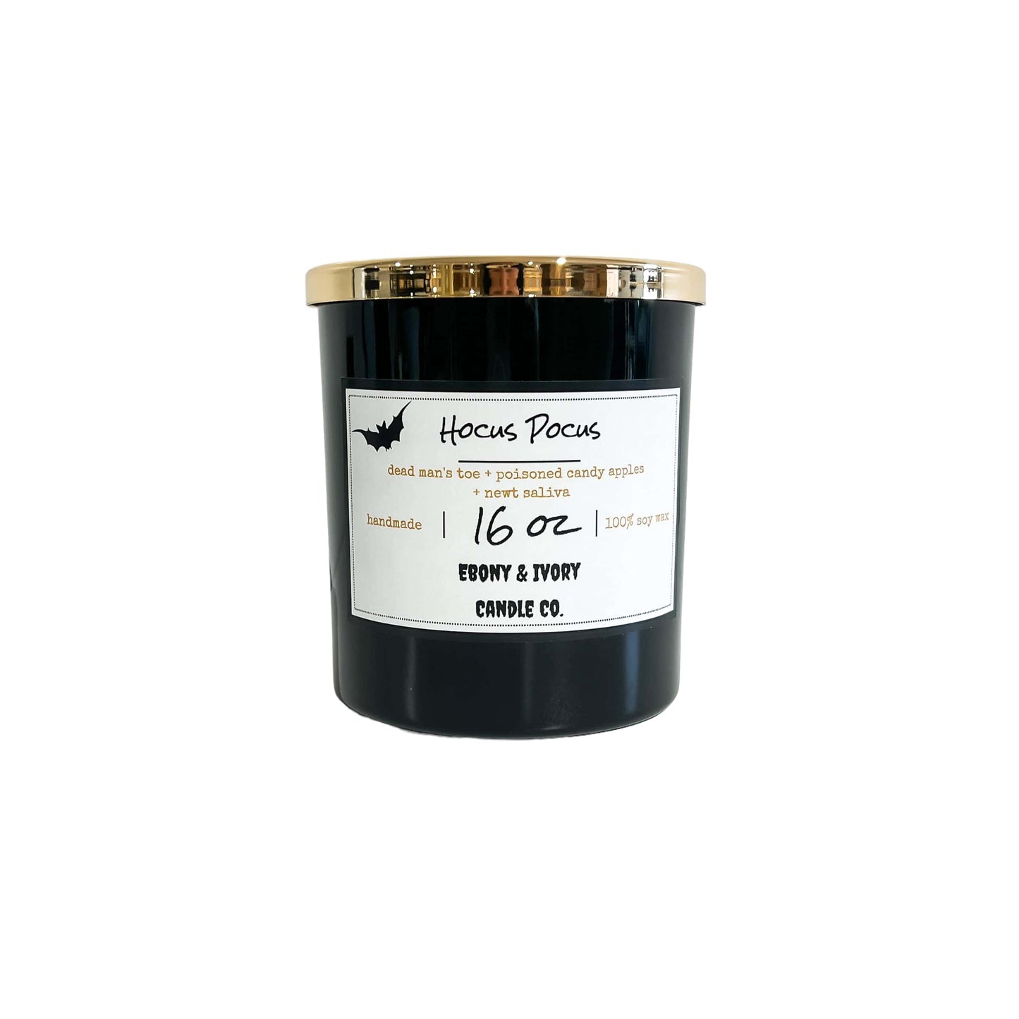 A black 16oz soy candle with a gold lid and a white label with a bat, named "hocus Pocus"