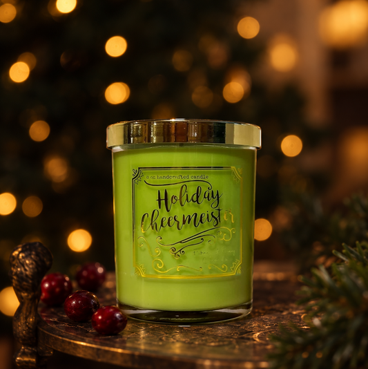 holiday cheermeister christmas candle that is green and with gold label
