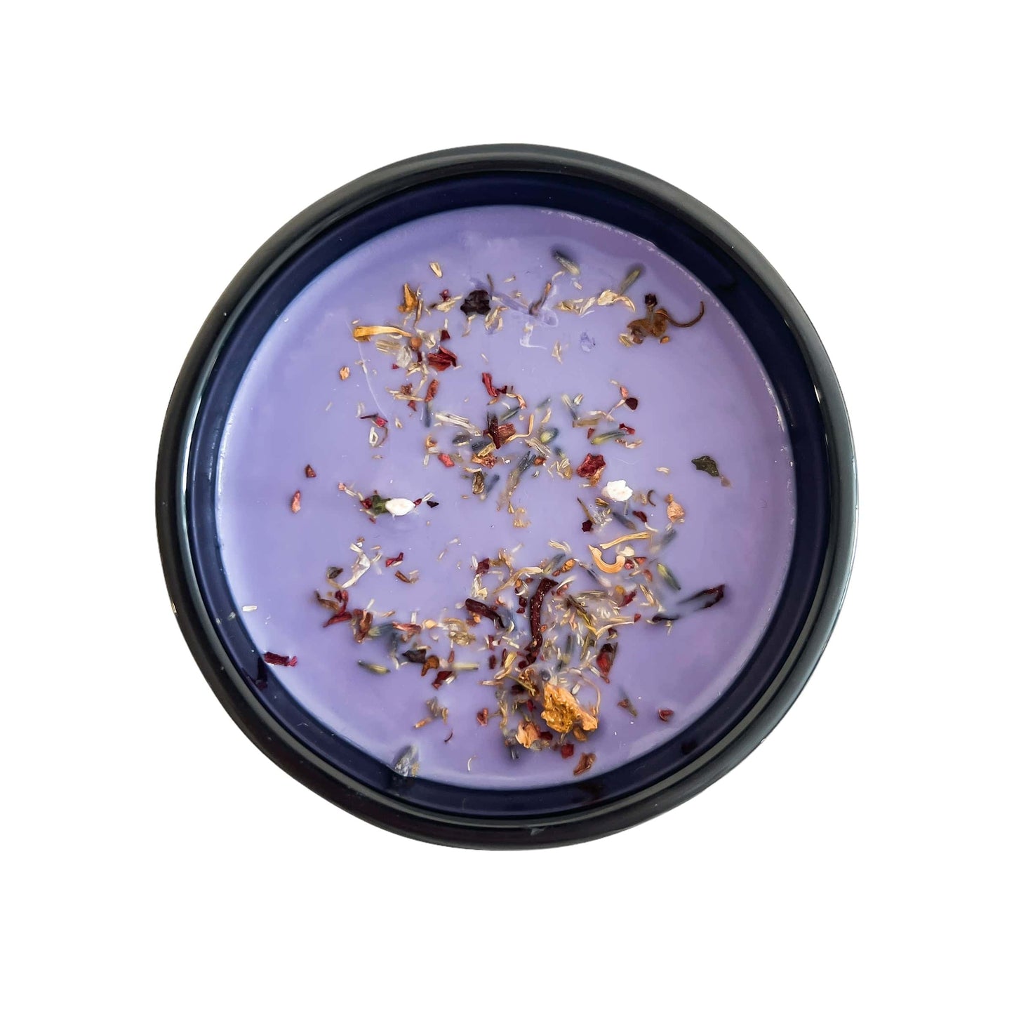 A top down shot of a black 16oz jar soy candle with purple wax and a mix of dried flower petals on top, on a white background, made by Ebony & Ivory Candle Co in Lethbridge, Alberta, Canada