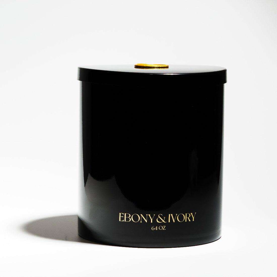 Black luxury candle jar with gold logo and gold seal. Best non toxic candle Canada, huge large statement soy candle. 4 wick. Ebony & Ivory candle co.