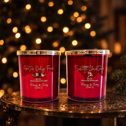 red christmas jar candles withe gold lids that read Santas only fans and merry fucking christmas