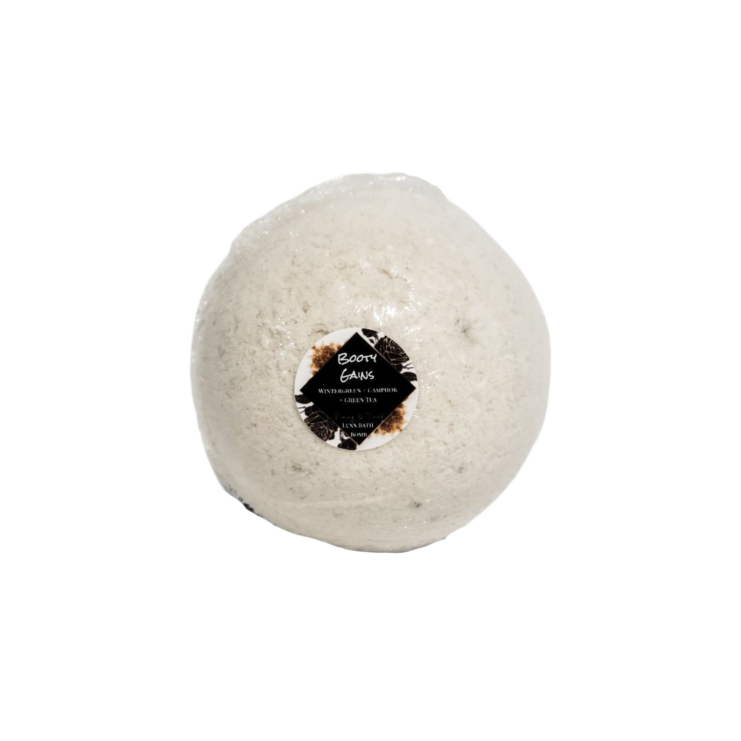 A white bath bomb with a round sticker label named Booty Gains, on a white background, made by Ebony & Ivory Candle co in Lethbridge, Alberta, Canada