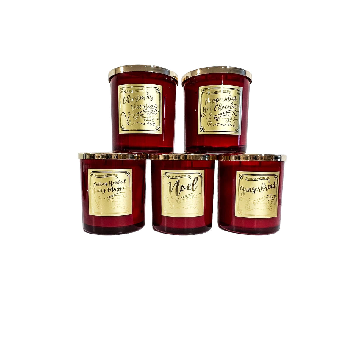 A stack of 5 red 16oz soy christmas candles with gold lids and gold labels
