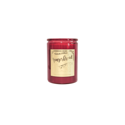 A red 12oz soy christmas candle with a gold label named "gingerbread"