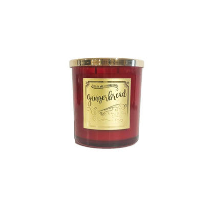 A red 16oz soy christmas candle with a gold lid and a gold label named "gingerbread