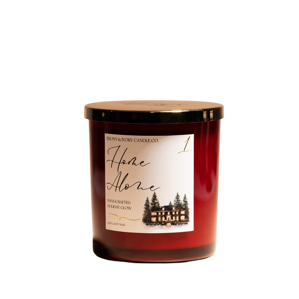 A red 16oz soy christmas candle with a gold lid and a white label named "home alone 1"