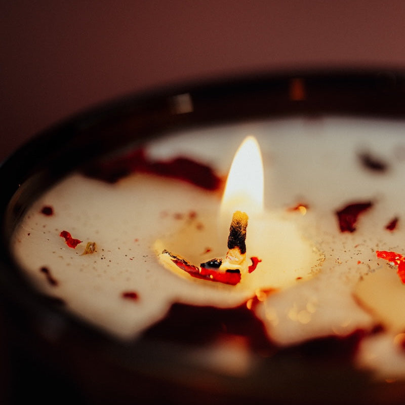 Candle in a dark container with a blurred background. lover tarot card soy candle for valentines day Canada.