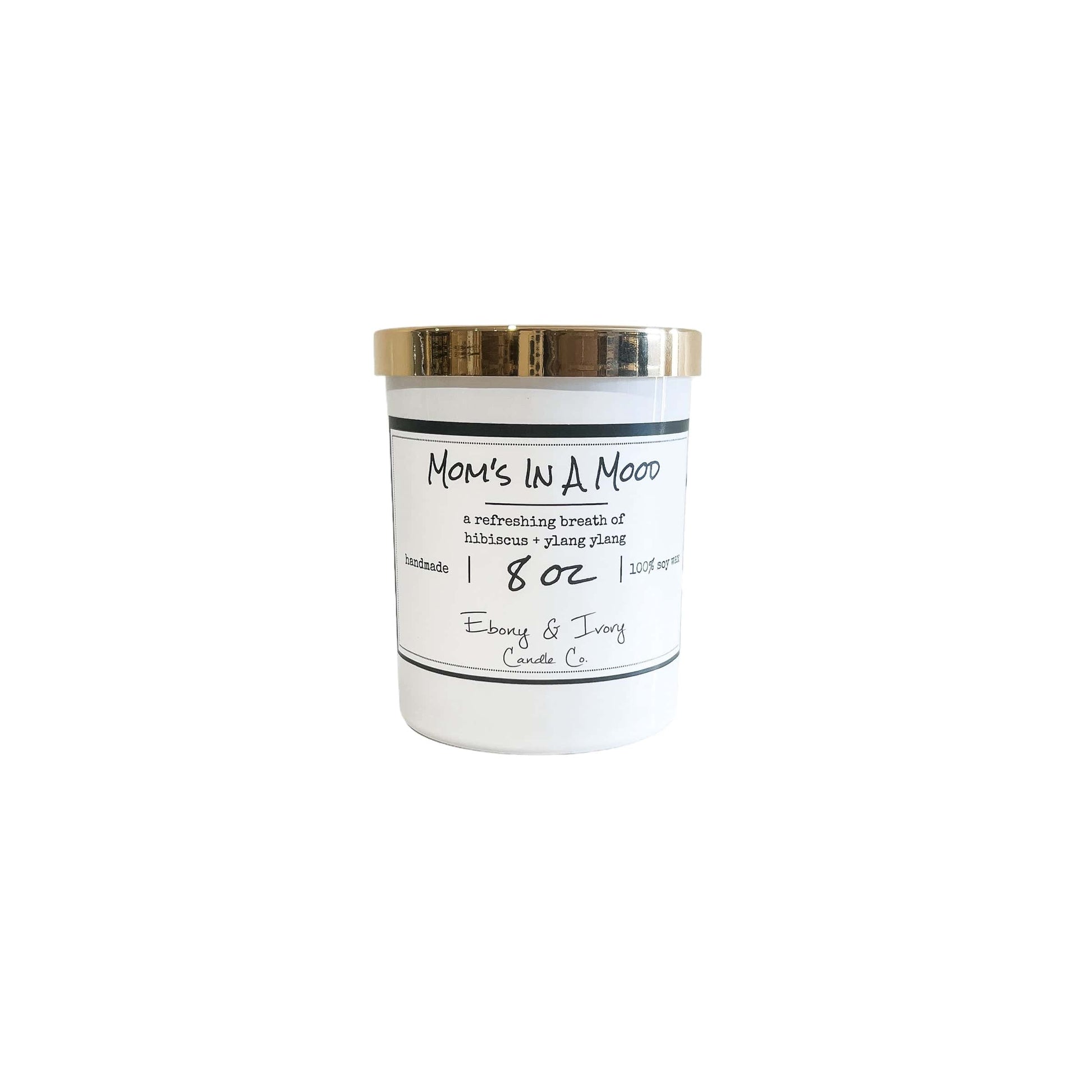 A white jar 8oz soy candle with a gold lid and a white label named Mom's in a Mood, on a white background, made by Ebony & Ivory Candle Co in Lethbridge, Alberta, Canada