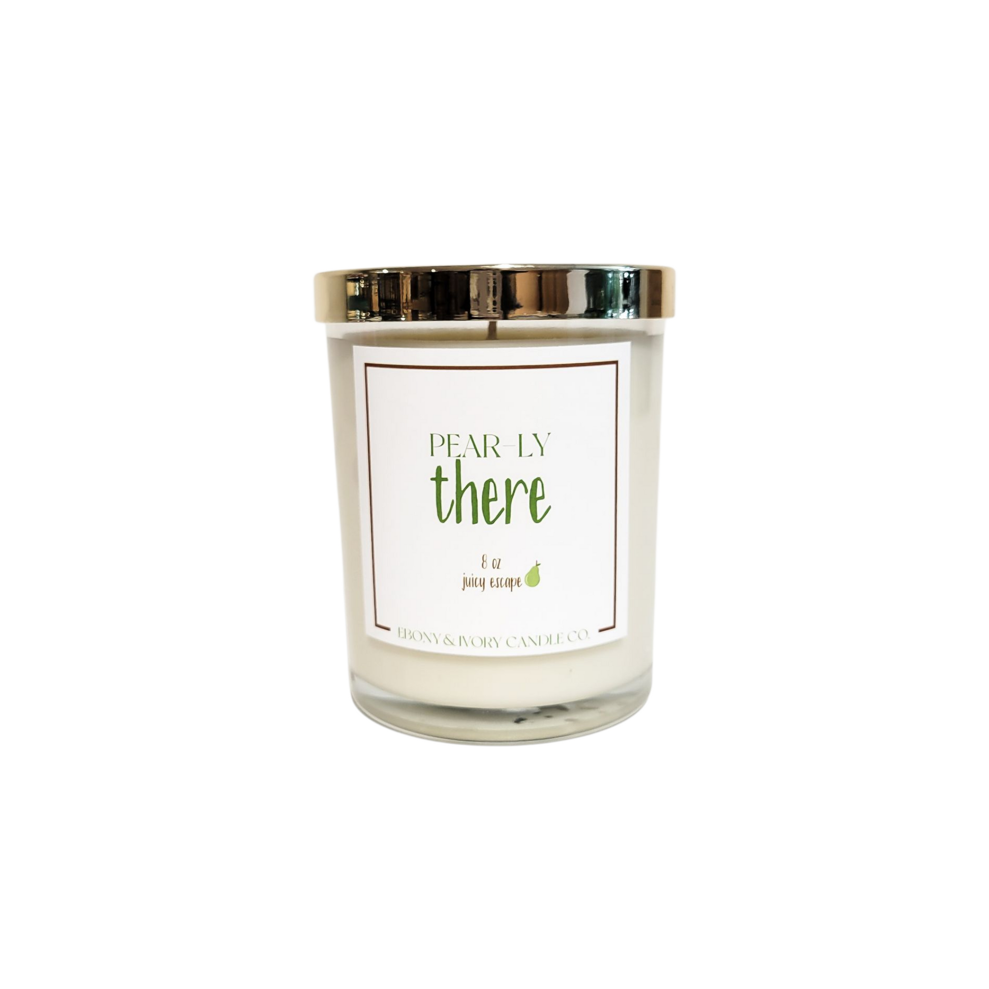 A clear glass 8oz soy candle with a gold lid and a white label named "Pear-ly There," Mae by Ebony & Ivory Candle Co in Lethbridge Alberta Canada