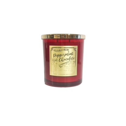 a red 16oz soy christmas candle with a gold lid and a gold label named "peppermint hot chocolate"
