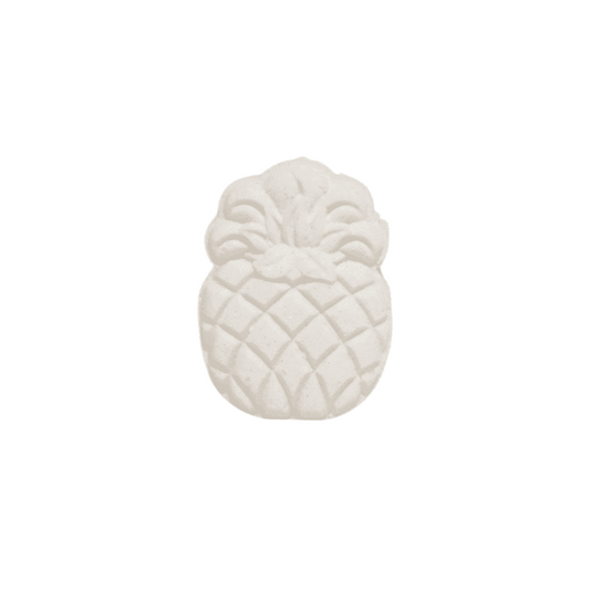 A pineapple shaped bath bomb on a white background. Made in Lethbridge, Alberta, Canada