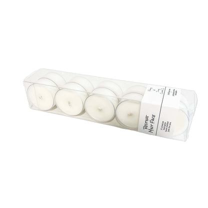 A clear box of 10 soy tea lights with a white label named Resting Mint Face, on a white background, made by Ebony & Ivory Candle Co in Lethbridge, Alberta, Canada