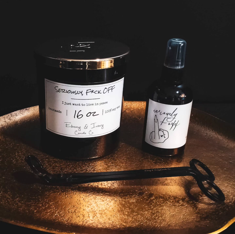 Candle and body spray that is a bug repellent soy candle and bug spray repellent with citronella and black pepper essential oil