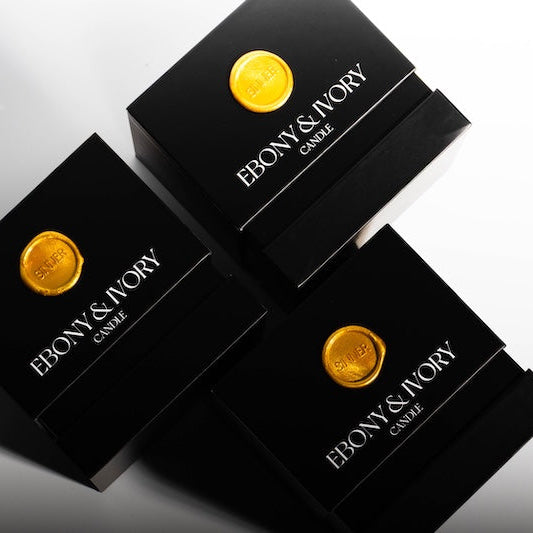 black candle jar with gift box and gold seal stamp. Luxury packaging. Gift for her. Candles Canada, Alberta. 