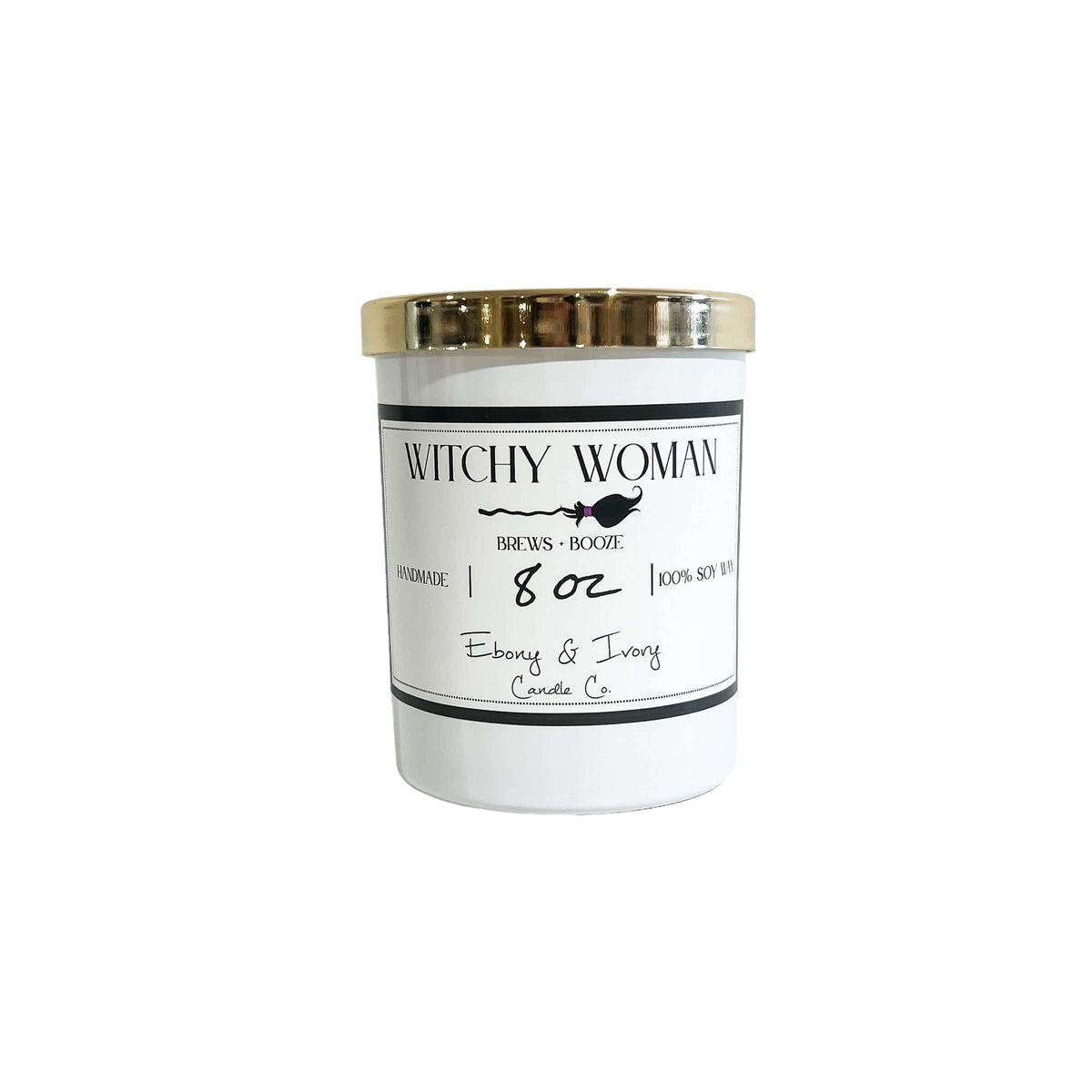 A white 8oz soy candle with a gold lid and a white label named "witchy woman"