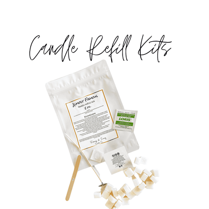 Candle refill kits with a white bag, a wick, scented soy wax cubes, a caution label, a glue dot, and an alcohol wipe