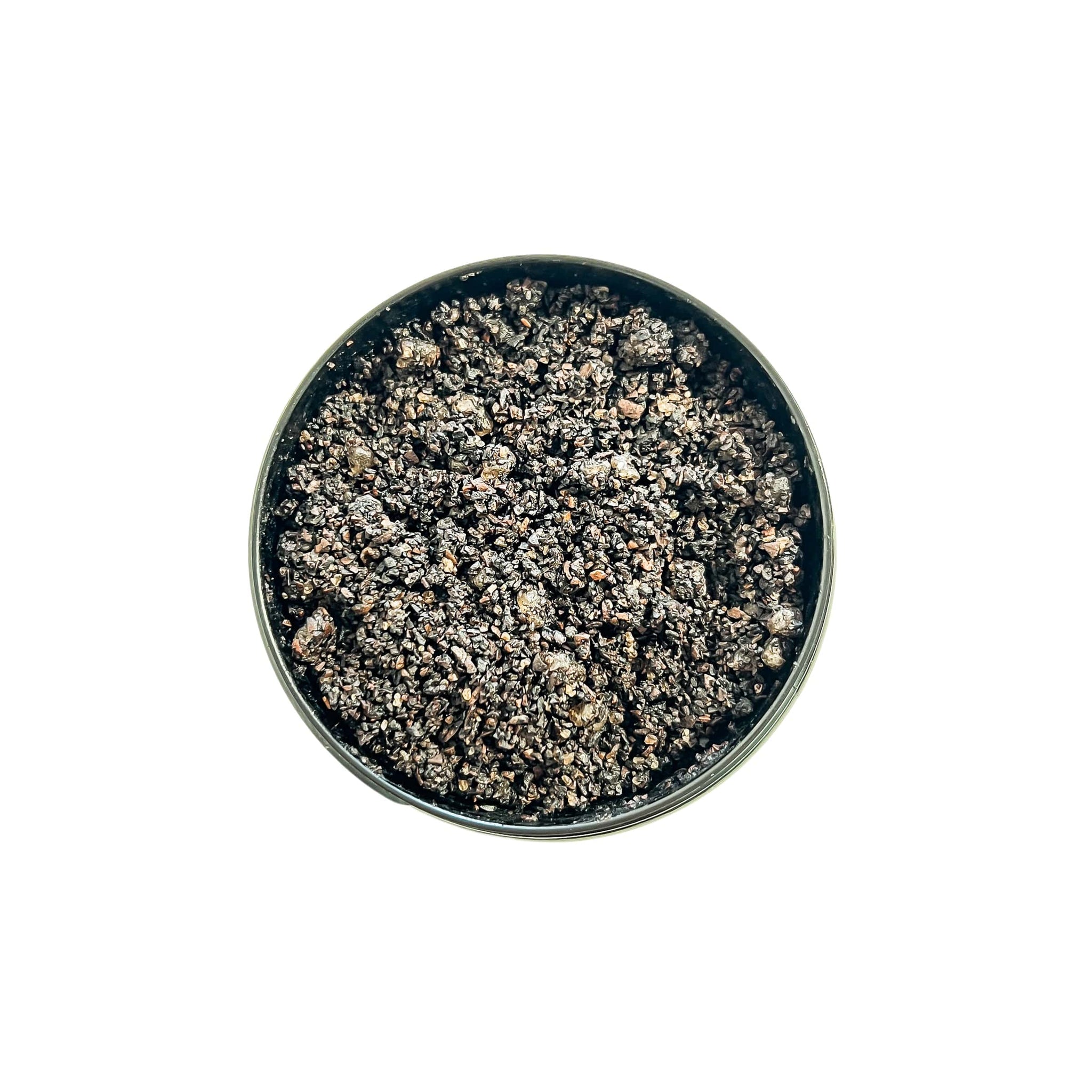 ebony and ivory candle co's coffee scrub in a black container
