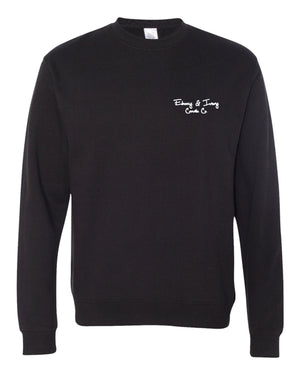 Front of a black ebony and ivory candle co crew neck sweater