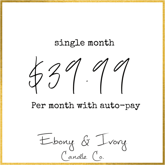 A white image with a gold border detailing a single month of Ebony & Ivory Candle Co's candle of the month subscription for $39.99 a month. From Lethbridge, Alberta, Canada