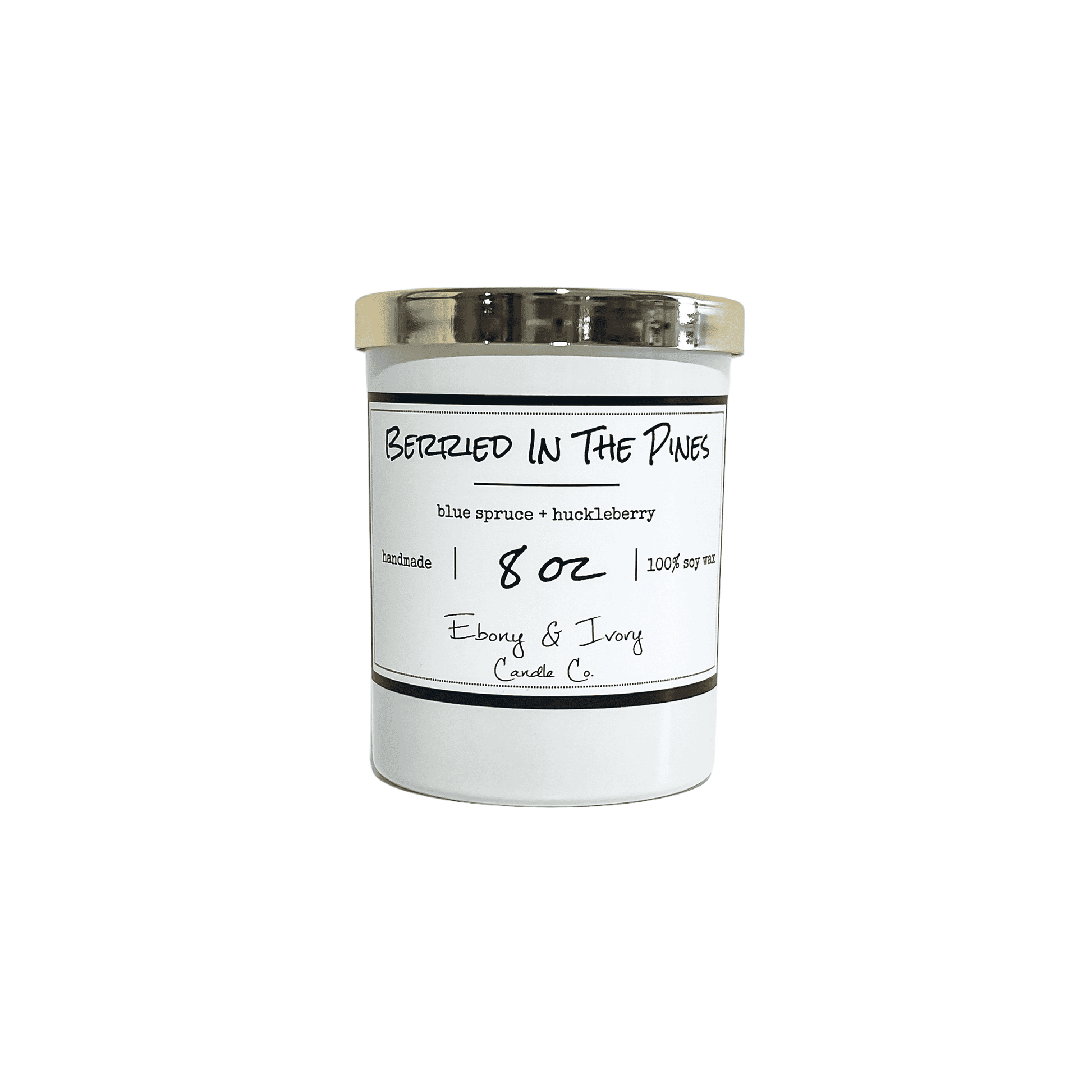 A white 8oz jar soy candle with a gold lid and a white label named Berried in the Pines, on a white background, made by Ebony & Ivory Candle Co in Lethbridge, Alberta, Canada