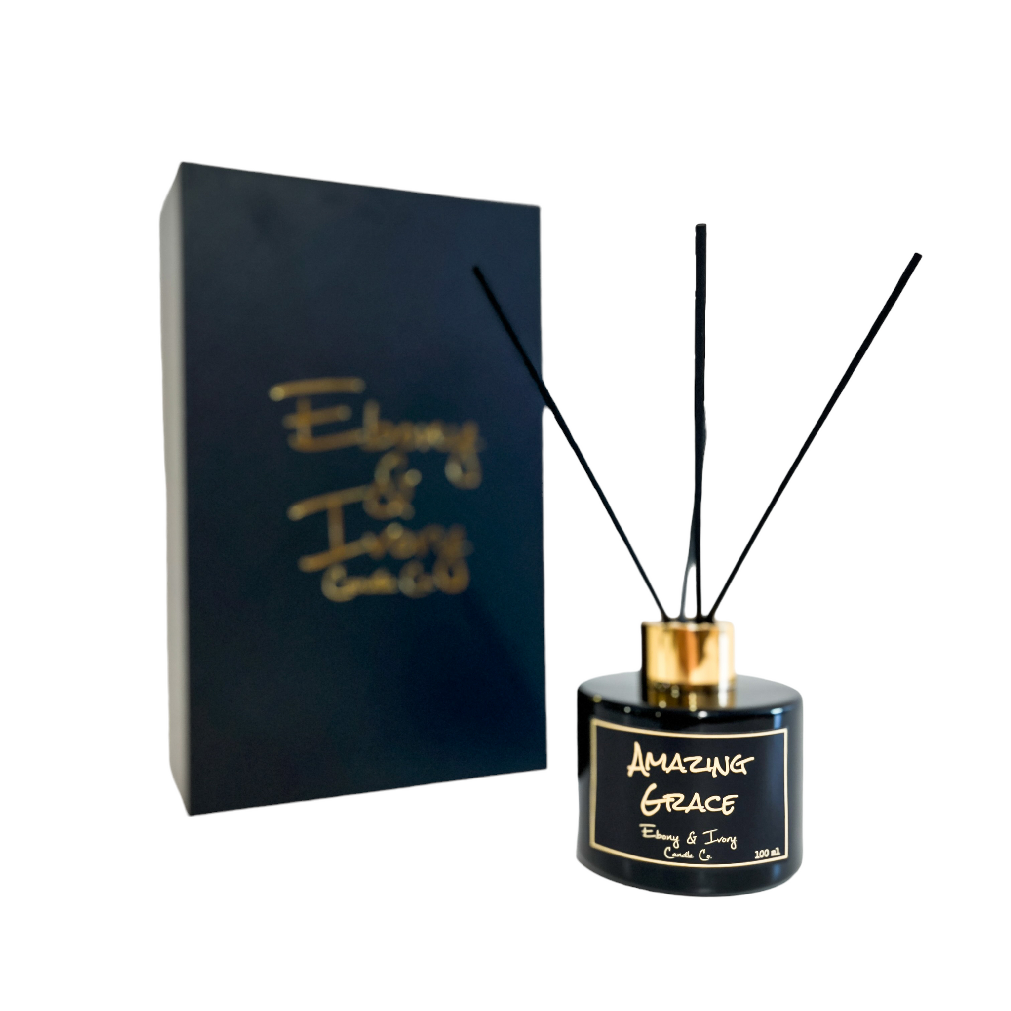 black one hundred milliliter, lavender, cedar, and cardamom scented reed diffuser with a gold lid and a black label that reads Amazing Grace