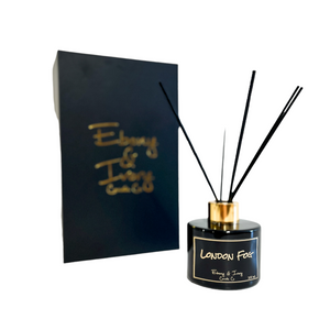 Black, one hundred milliliter, bergamot and vanilla scented reed diffuser with a gold lid and a black label that reads London Fog