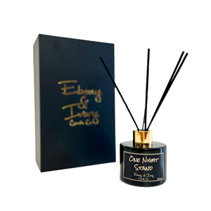 Black, one hundred milliliter, mahogany and apples scented reed diffuser with a gold lid and a black label that reads One Night Stand