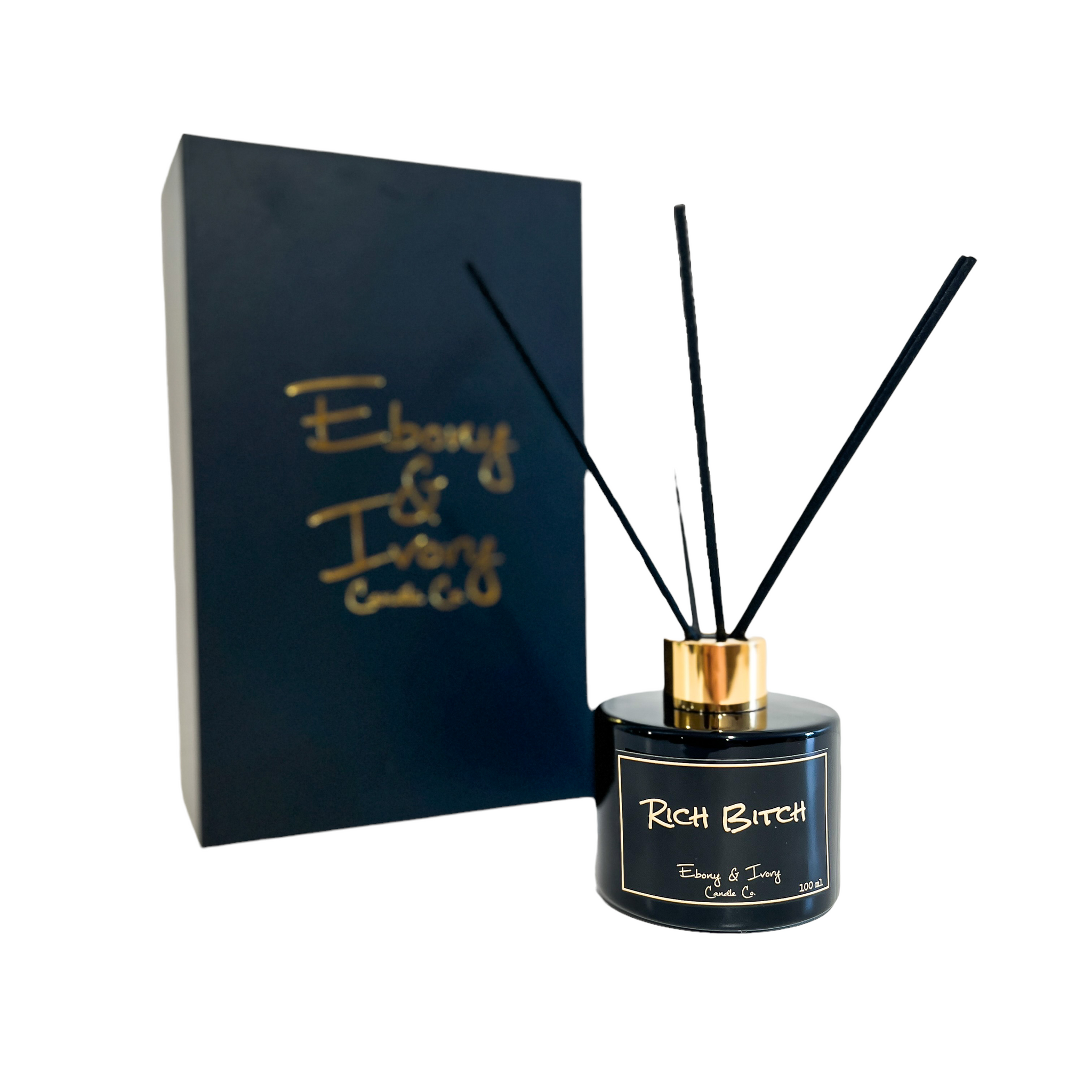 Black, one hundred milliliter, oud, bergamot, and citrus scented reed diffuser with a gold lid and a black label that reads Rich Bitch