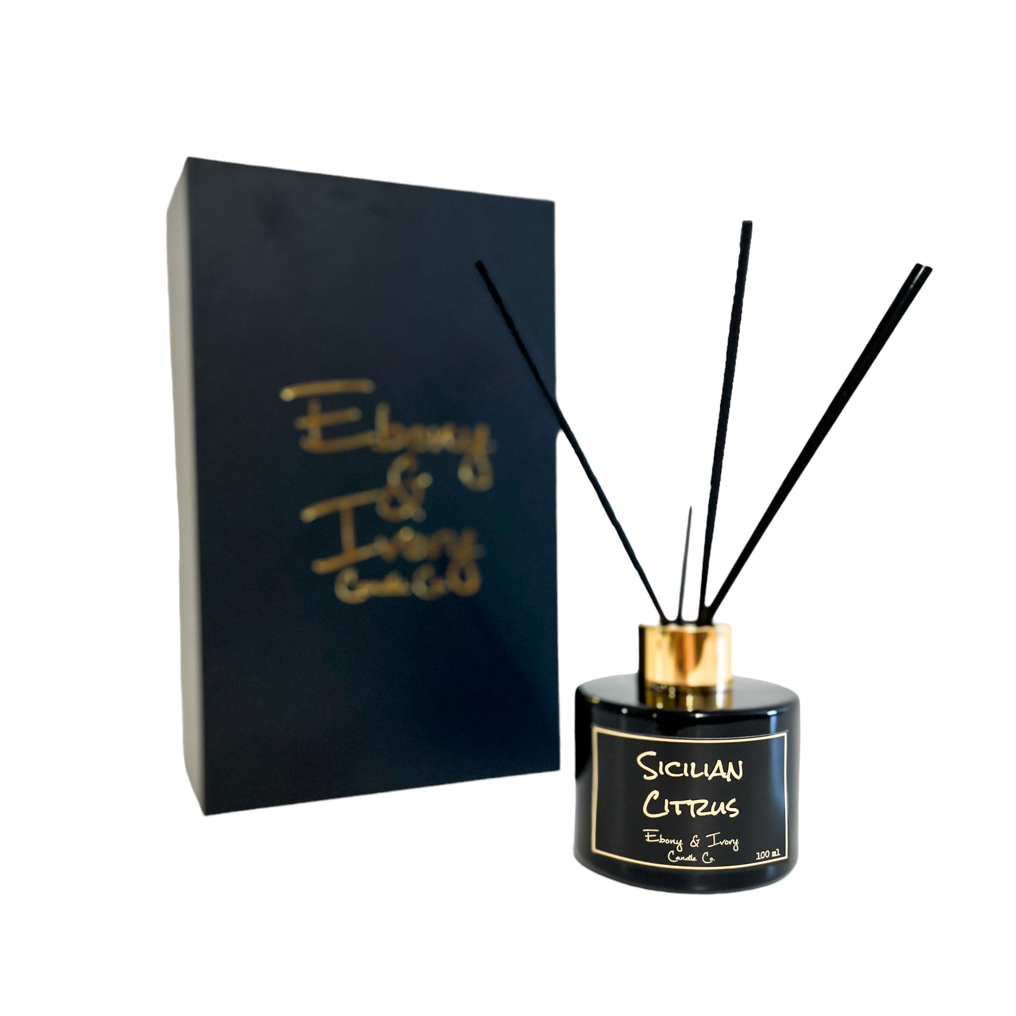 Black, one hundred milliliter, bergamot, grapefruit, and fresh greens scented reed diffuser with a gold lid and a black label that reads Sicilian Citrus