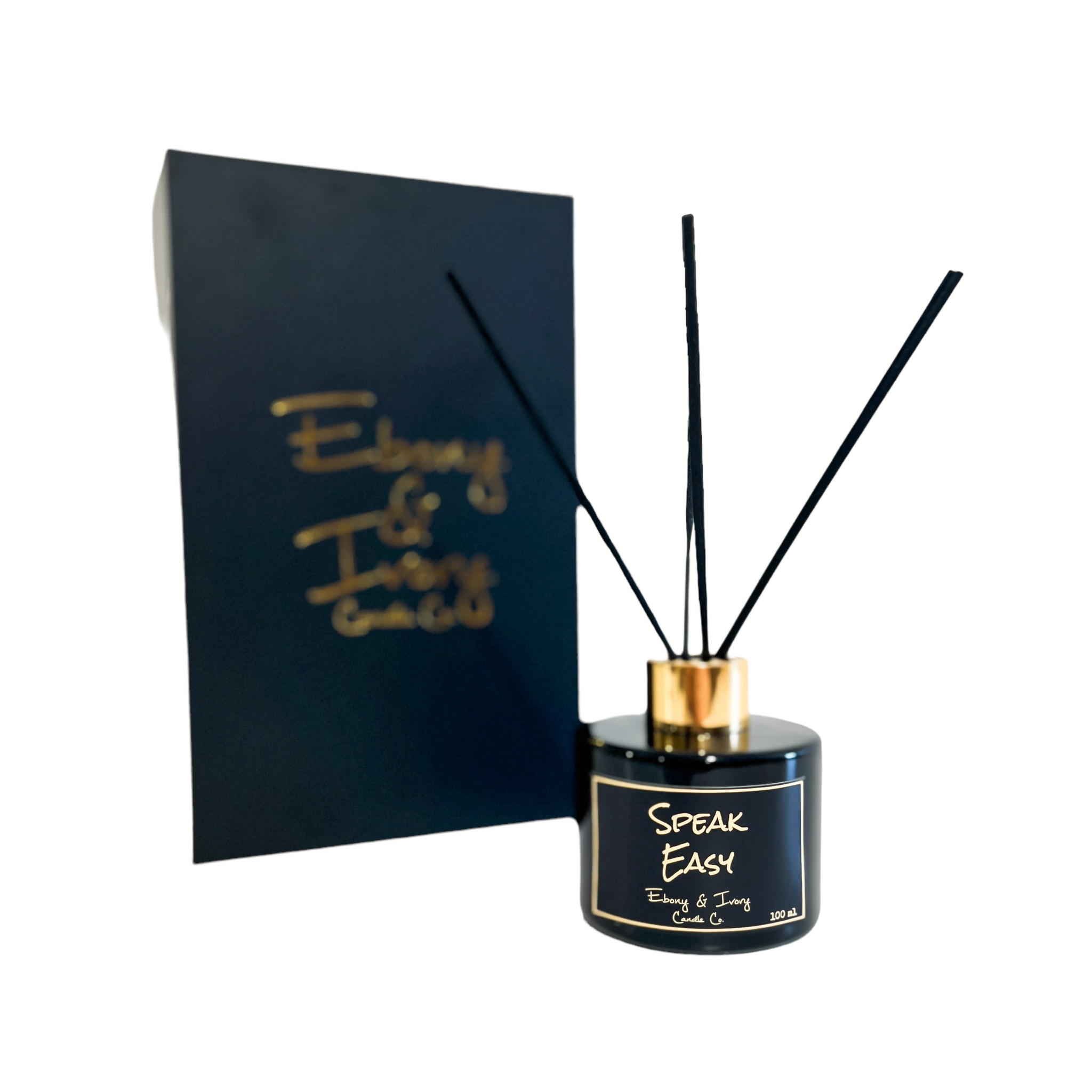 Black, one hundred milliliter, tobacco and vanilla scented reed diffuser with a gold lid and a black label that reads Speak Easy