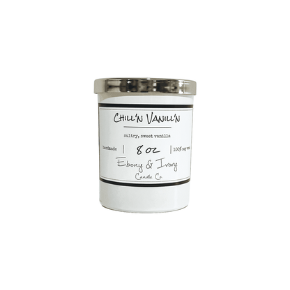 White, eight ounces, sweet vanilla scented soy wax candle with a gold lid and a white label that reads Chill'n Vanill'n