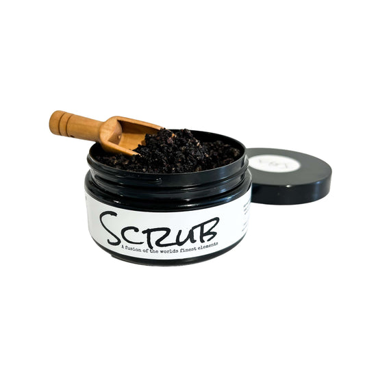 ebony and ivory candle co's 5oz coffee scrub in a round black container with a white label named SCRUB and a small wooden scoop, made in Lethbridge, Alberta, Canada