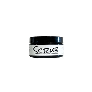 ebony and ivory candle co's five ounce coffee scrub in a black container with a white label