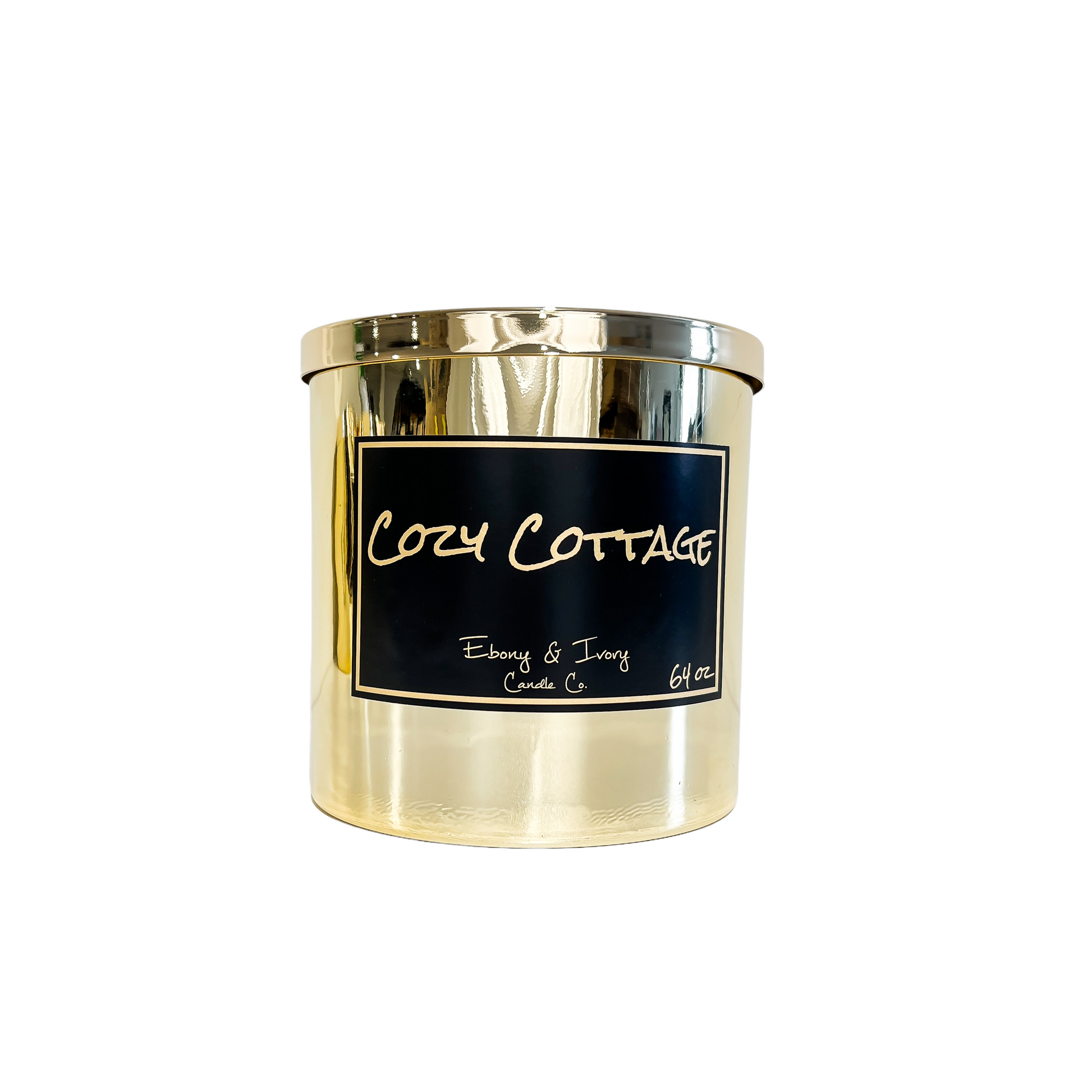 Gold, sixty four ounces, frozen pine, warm spice, and brown sugar scented soy wax candle with a gold lid and a black label that reads Cozy Cottage