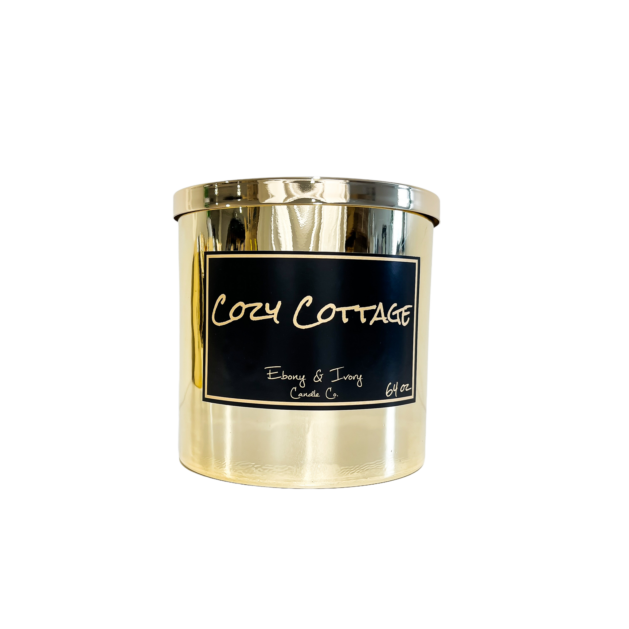 Gold, sixty four ounces, frozen pine, warm spice, and brown sugar scented soy wax candle with a gold lid and a black label that reads Cozy Cottage