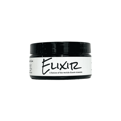 Black container with a white label that reads "elixir" and is filled with pink Himalayan salt, dead sea salt, epsom salt, and peppermint essential oils.